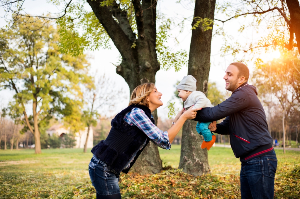 Happy parents with their baby boy
